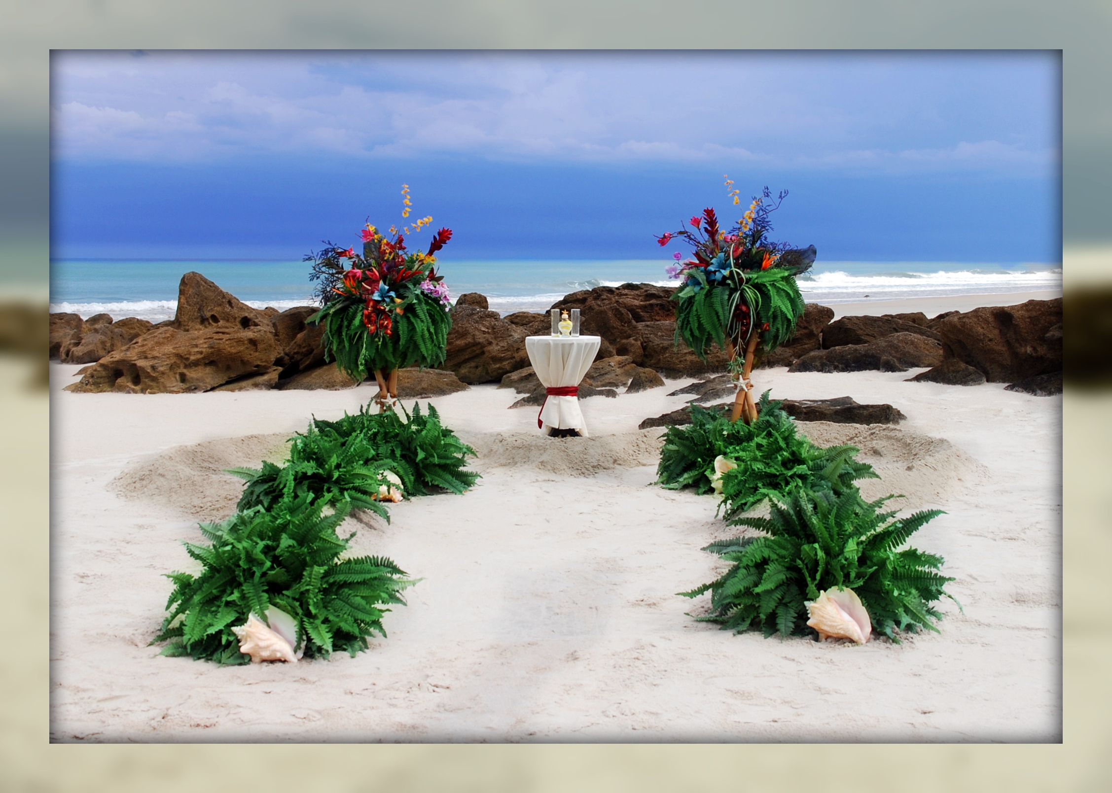 Tropical Seaside Blooms with Added Sand Ceremony Table