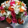 Assorted Roses, White Lilies and Hypericum Berries